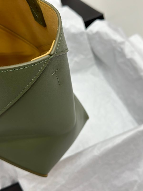 Loewe Puzzle Fold Bag vs. Other Designer Handbags: A Comparison